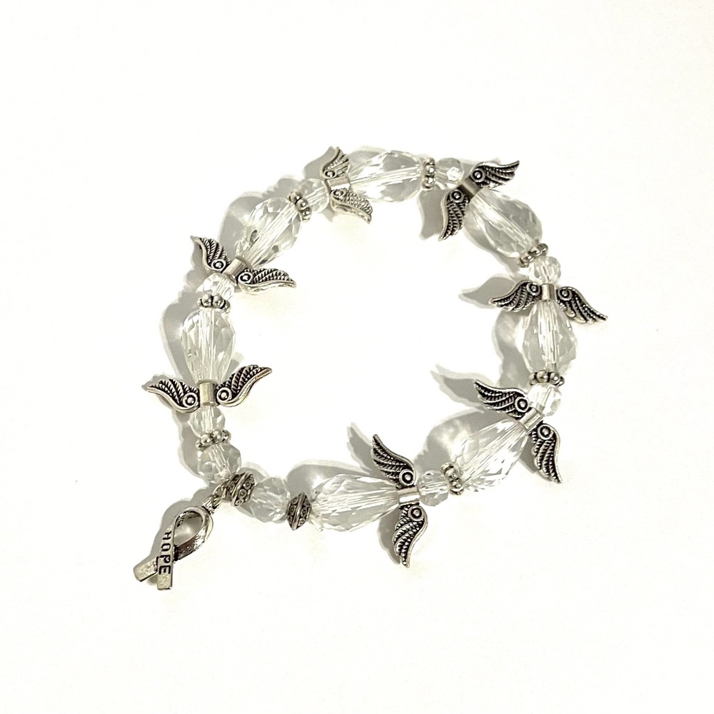 Angel bracelet with clear glass beads.